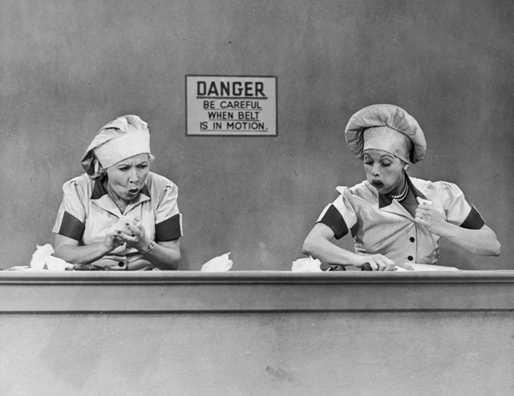 Lucy and Ethel performing "QC" on chocolates at a candy factory. (I Love Lucy, 1952)