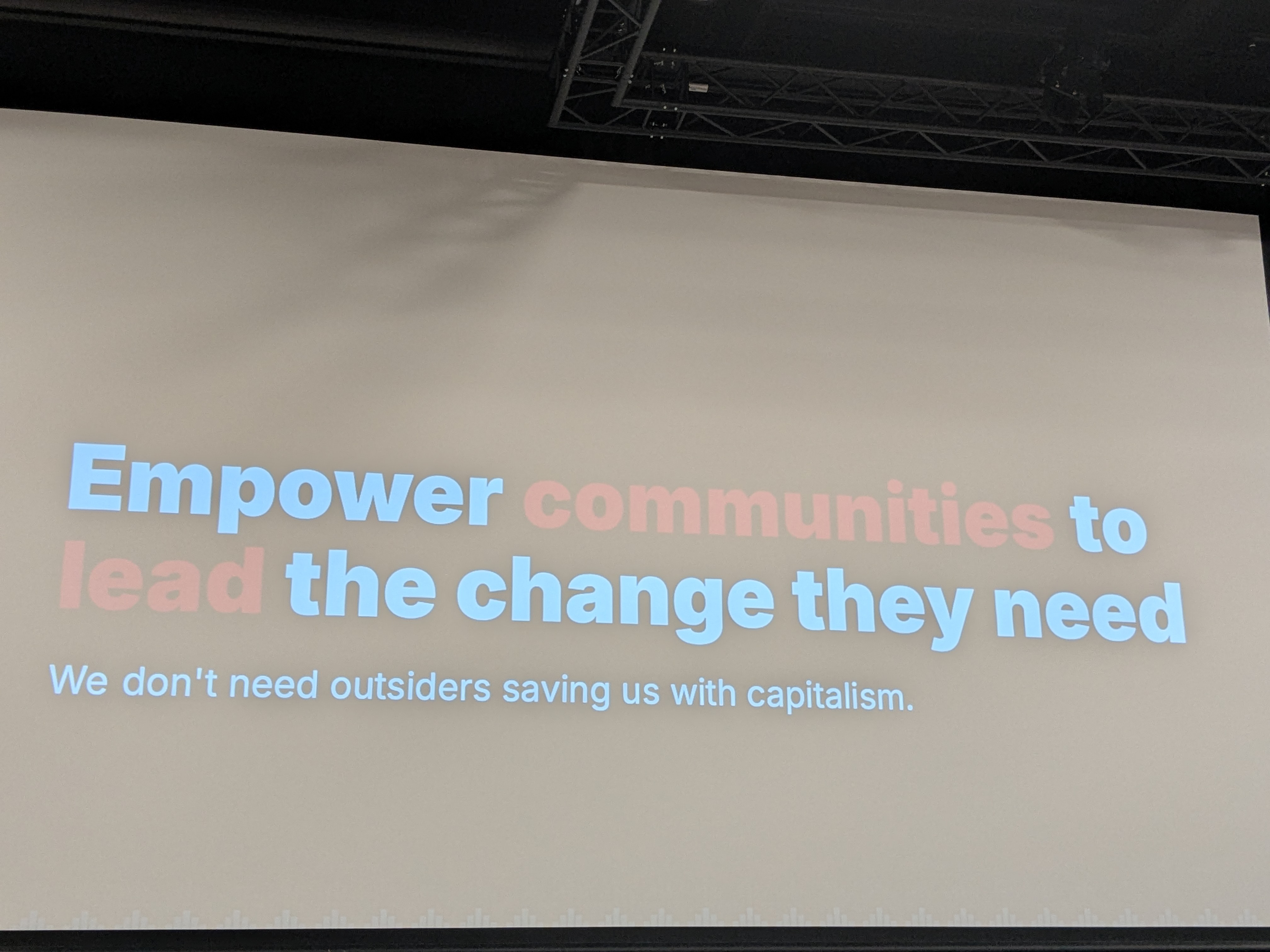  'Empower communities to lead the change they need. We don't need outsiders saving us with capitalism' from third Keynote talk by Peter-Lucas Jones.